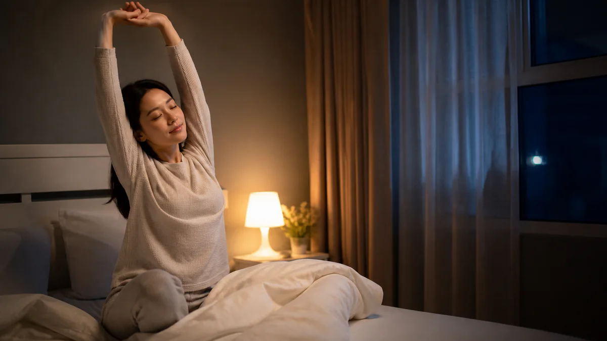 Person sleeping in a quiet, comfortable bedroom